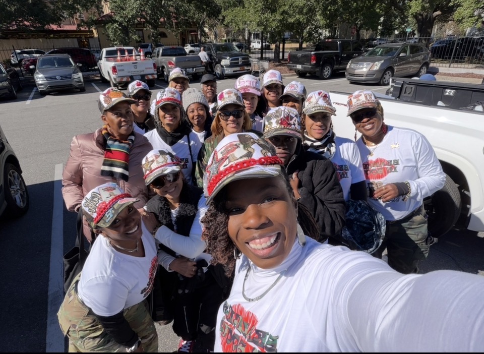 Members selfie in the parking lot before the Veteran's Day Parade