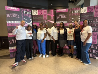 Members cheering together at the Savannah Steel soccer event