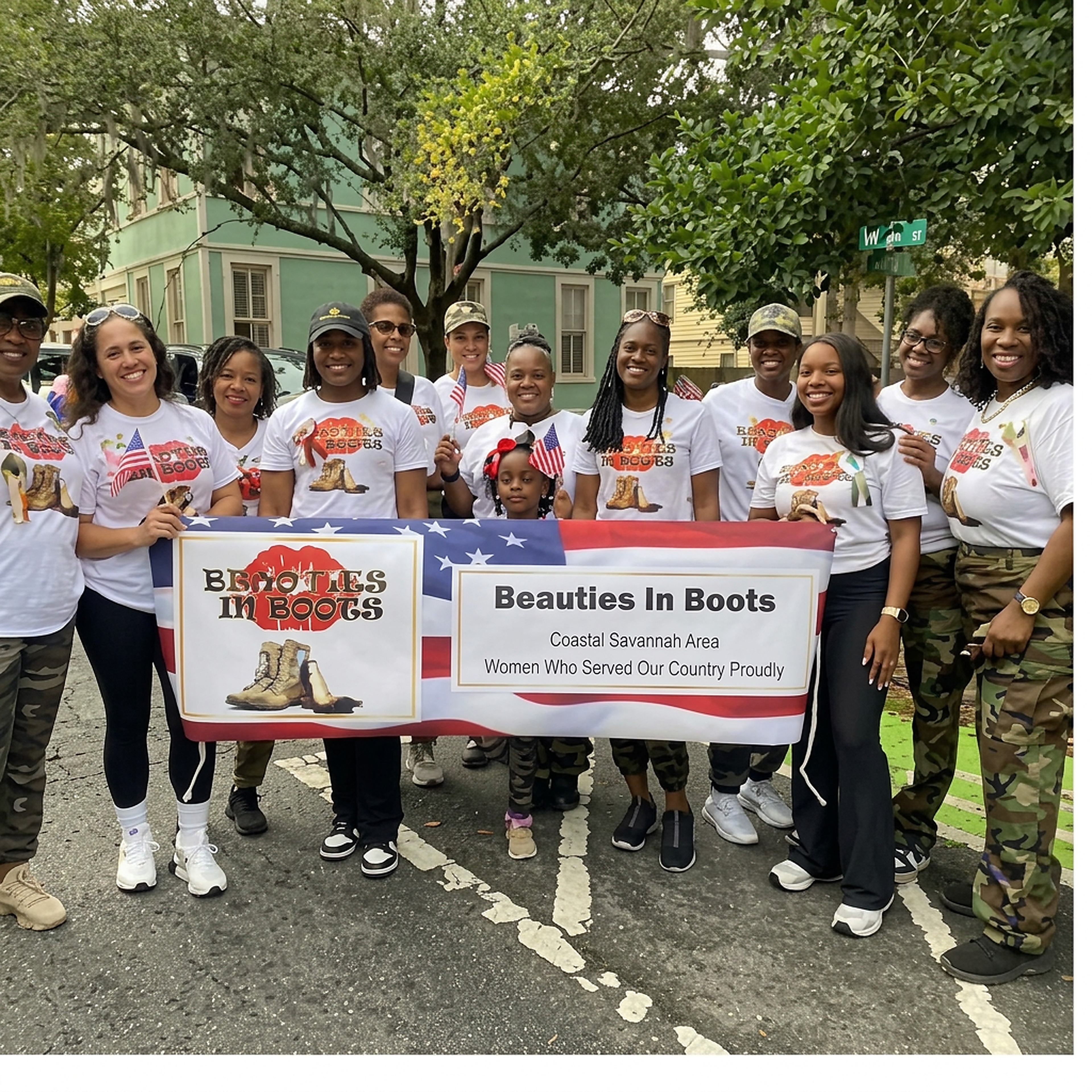 Members marching with the Beauties in Boots banner at the Veteran's Day Parade